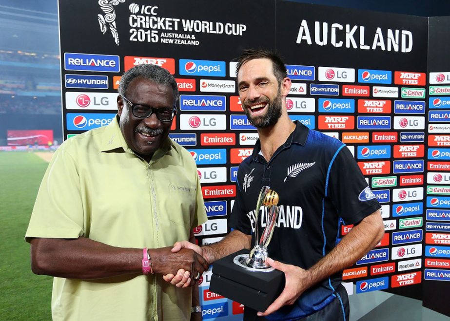 Grant Elliott is all smiles as he collects the Man-of-the-Match award from Clive Lloyd during the 2015 Cricket World Cup semi final match between New Zealand and South Africa at Eden Park in Auckland, New Zealand on Tuesday.