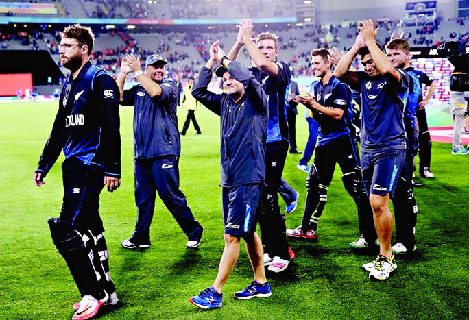 New Zealand players thank their fans after their victory in the semi-final Cricket World Cup match between New Zealand and South Africa at Eden Park in Auckland on Tuesday.