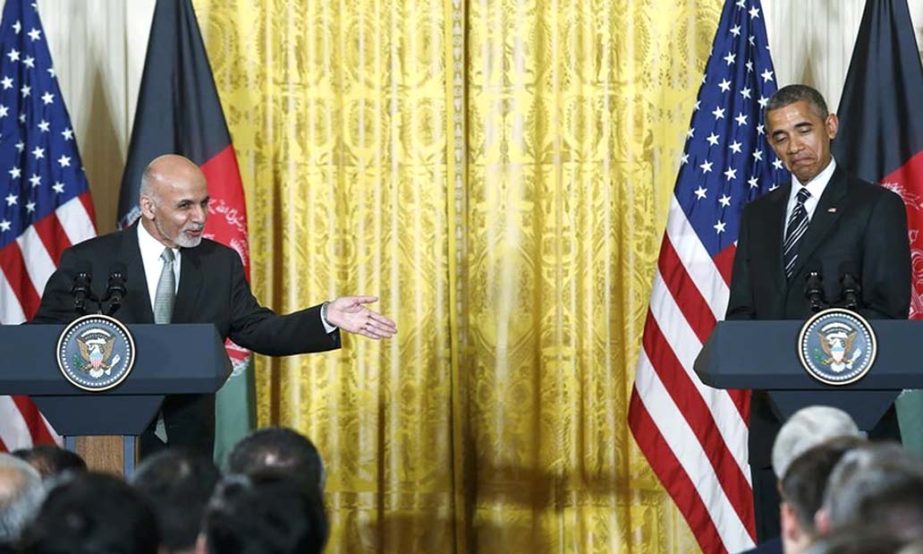 Barack Obama reacts to a comment by Ashraf Ghani during a joint news conference at the White House on Tuesday.