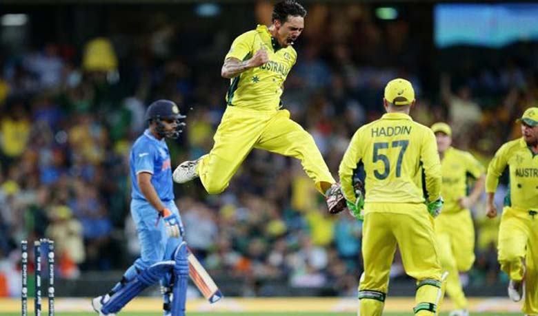 Mitchell Johnson sets off after bouncing out Rohit Sharma, Australia v India, World Cup 2015, 2nd semi-final, Sydney, March 26, 2015. Photo: : espncricinfo