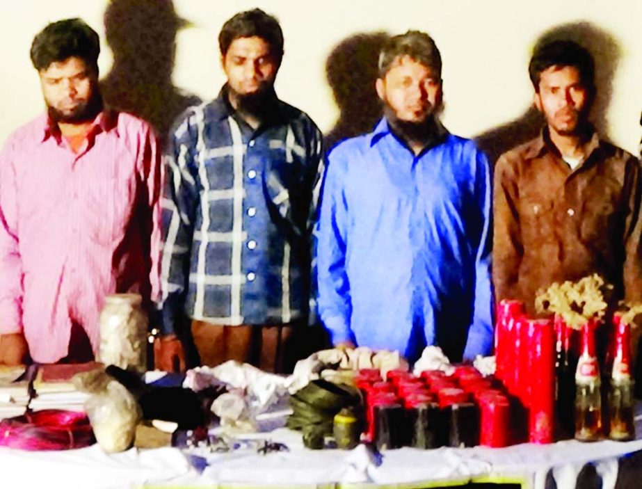 RAB team on information arrested four JMB members from Dakkhin Khan in city along with grenade, petrol bombs and explosives in their possession on Friday.