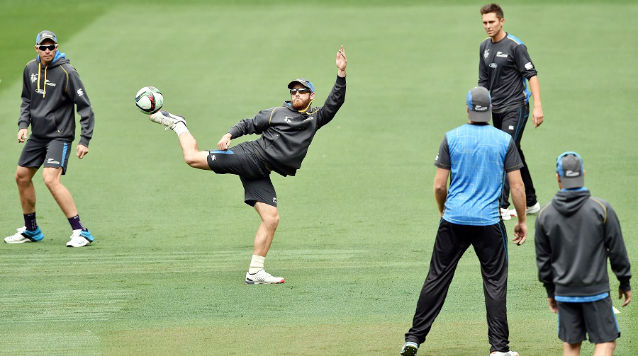 New Zealand's Kane Williamson (2L) kicks the ball while playing football during a training session at the Melbourne Cricket Ground (MCG) on Friday ahead the 2015 Cricket World Cup final match between Australia and New Zealand in Melbourne.