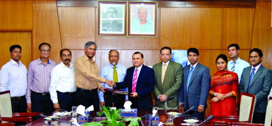 NBL Securities Ltd and Investment Corporation of Bangladesh sign a loan agreement under 'Special Scheme for Affected Small Investors of Stock Market' in the city recently. High officials of both the institutions were present.