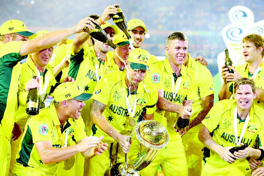 Michael Clarke gets in the middle of celebrations after the Cricket World Cup final match between Australia and New Zealand at Melbourne Cricket Ground in Melbourne, Australia on Sunday.