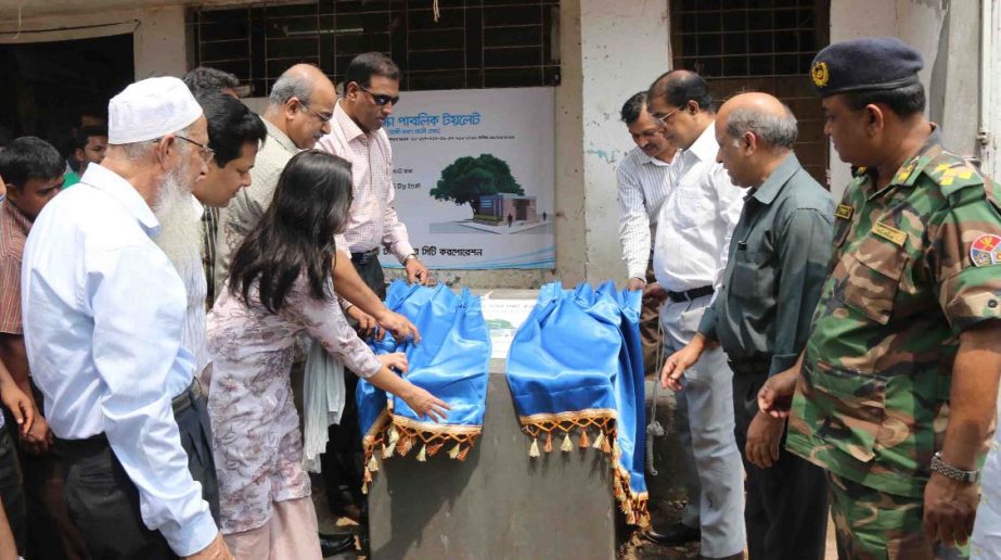 Dr Rakhal Chandra Barman, Administrator of Dhaka North City Corporation, inaugurating three-construction work of public toilets, funded by Wateraid Bangladesh, in the city on Monday.