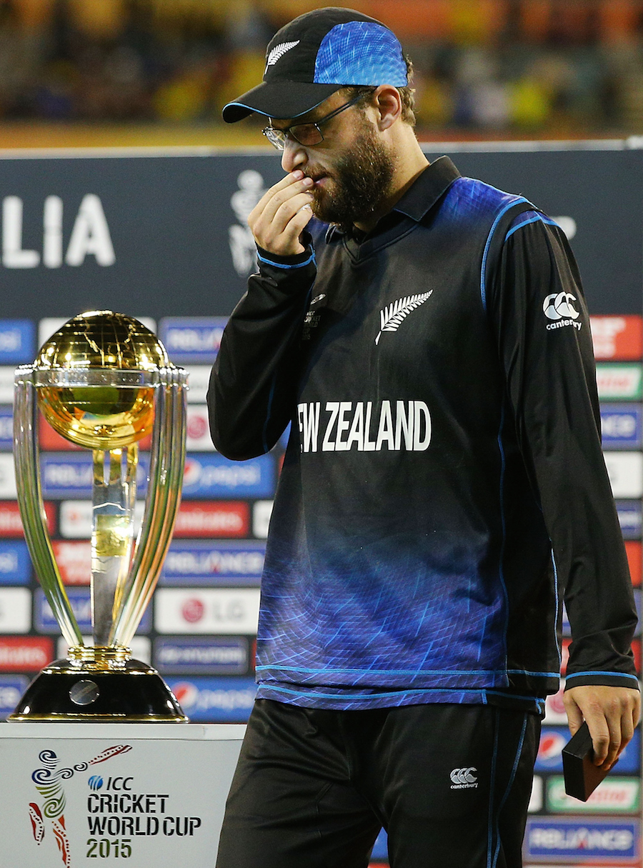 Daniel Vettori of New Zealand walks past the trophy after their defeat during the 2015 ICC Cricket World Cup final match between Australia and New Zealand at Melbourne Cricket Ground on Sunday.