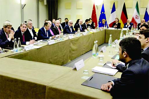 US Secretary of State John Kerry (L), British Foreign Secretary Philip Hammond (2nd L), Russian Foreign Minister Sergei Lavrov (4th L), German Foreign Minister Frank Walter Steinmeier (7th L), French Foreign Minister Laurent Fabius (8th L) and Chinese For