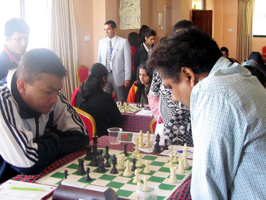 GM Ziaur Rahman (right) in action against his counterpart during the match of the Asian Zonal Chess Championship at Kathmandu, the capital city of Nepal on Tuesday.