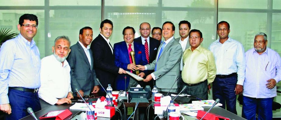 MA Hashem, Chairman and Muhammed Ali, Managing Director of United Commercial Bank Limited, receiving 'Golden Globe Tigers' Award 2015' in banking & financial services category in Kuala Lumpur, Malaysia recently. Mirza Mahmud Rafiqur Rahman, Additional