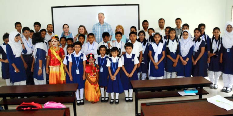 UK teachersâ€™ team exchanging views with the teachers and students of Mirza Ahmed Ispahani High School in Chittagong on Tuesday.