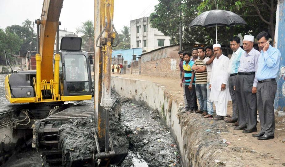 CCC Acting Mayor Lion Mohammad Hossain visiting earth and garbage removal works from Chaktai canal in the city on Thursday.