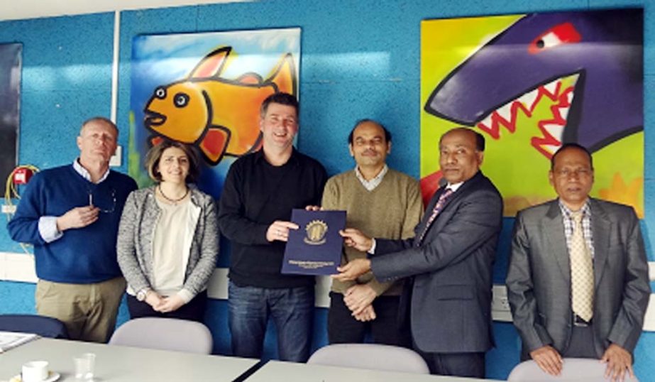 CUET VC Prof Dr Jahangir Alam handing over copy of the MoU of the project to the authority of Wageningen University of Netherlands recently.