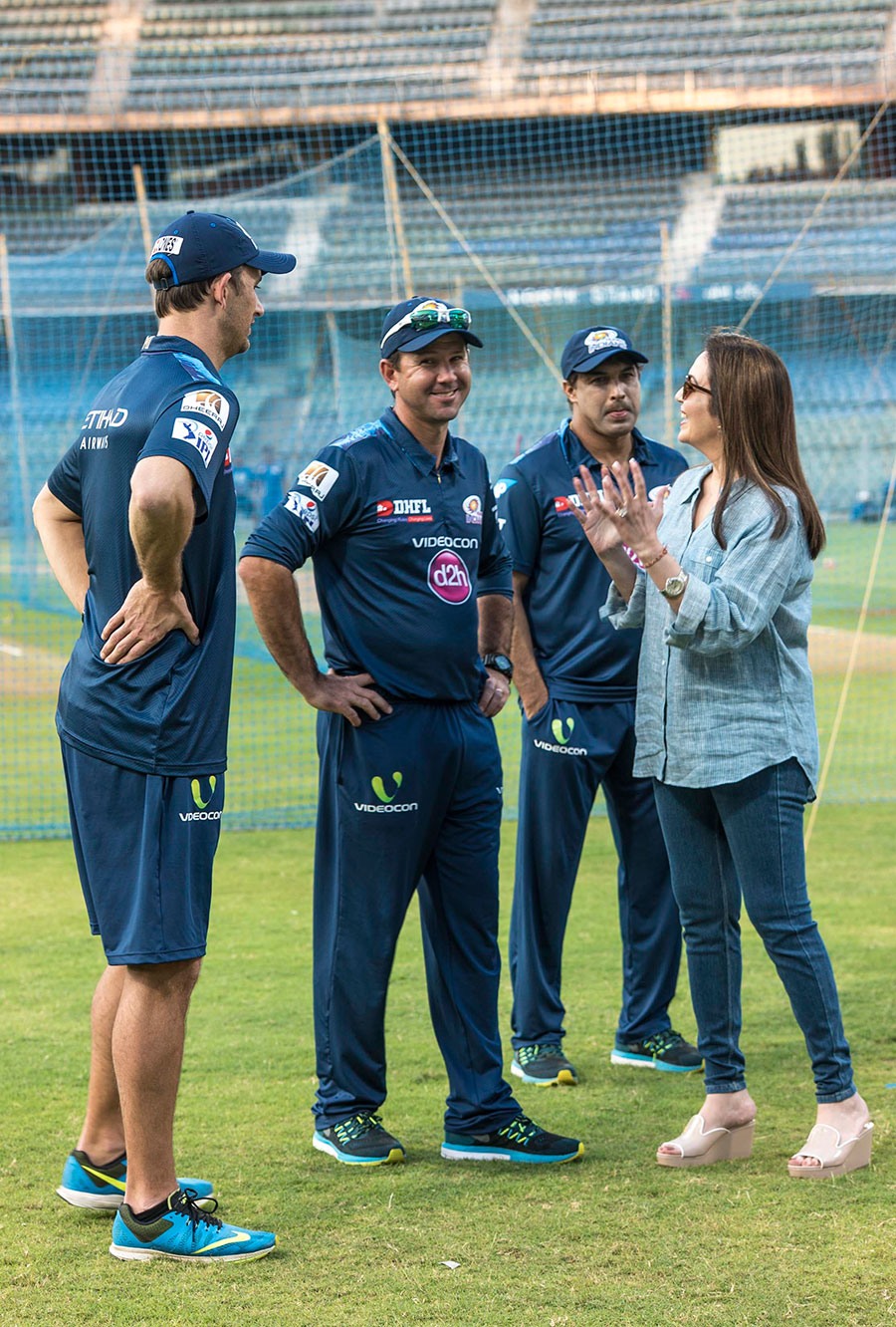 Mumbai Indians owner Nita Ambani talks to members of the team's coaching staff at Mumbai on Friday.