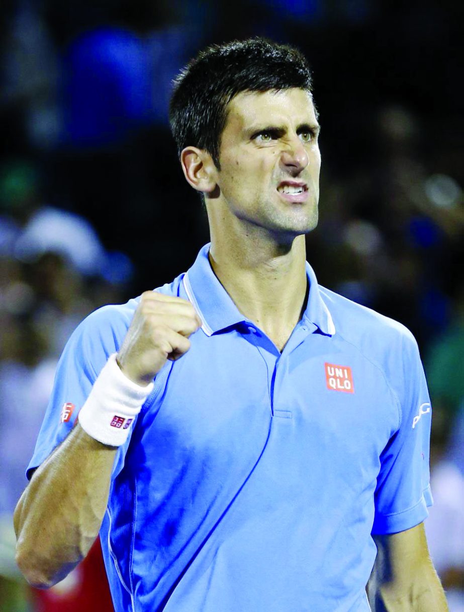 Novak Djokovic of Serbia celebrates after he defeated John Isner, 7-6 (3), 6-2, at the Miami Open tennis tournament in Key Biscayne, Fla on Friday.