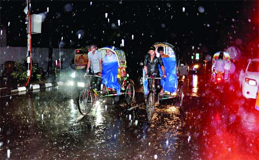 Some rickshawpullers kept on plying their rickshaws on the city streets defying hailstorm and gusty storm on Saturday evening.