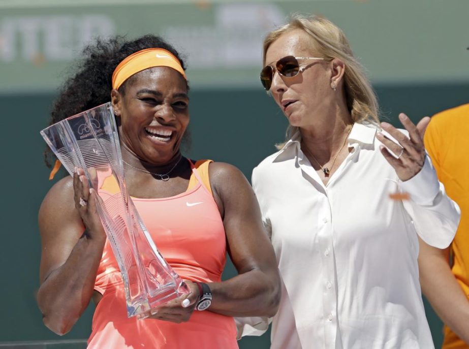 Serena Williams (left) and Martina Navratilova pose for photographers after the women's final match at the Miami Open tennis tournament in Key Biscayne, Fla on Saturday.