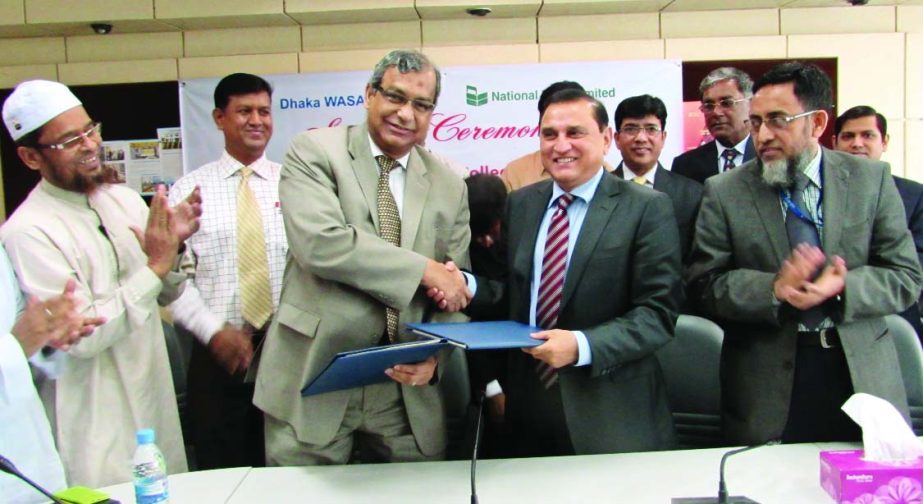 Engr Taqsem A Khan, Managing Director of Dhaka WASA and Managing Director of National Bank Limited Shamsul Huda Khan present at the inauguration of online bill payment system `Realtime Online' at DWASA board room on Monday. From now DWASA customers will