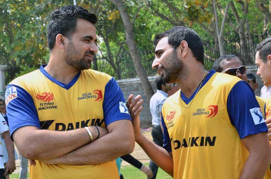 Mohammed Shami has a chat with Zaheer Khan at Delhi on Monday.