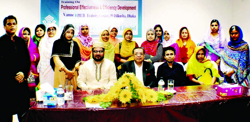 Dr M Mosharraf Hossain, Chairman and Managing Director of Rapport Bangladesh Limited along with the participants of a Training Workshop on Communication and Team Building for the senior and mid level executives of Prime Islami Life Insurance Limited at it