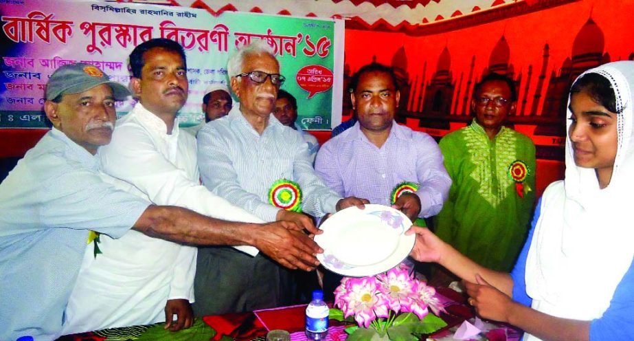 FENI: Aziz Ahmed Chowdhury, Administrator , Feni Zilla Parishad distributing prizes among the winners of annual sports competition of Elahi High School as Chief Guest on Tuesday.
