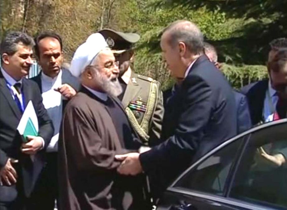 Turkey's President Tayyip Erdogan meets his Iranian counterpart Hassan Rouhani in Tehran despite tensions over Yemen.