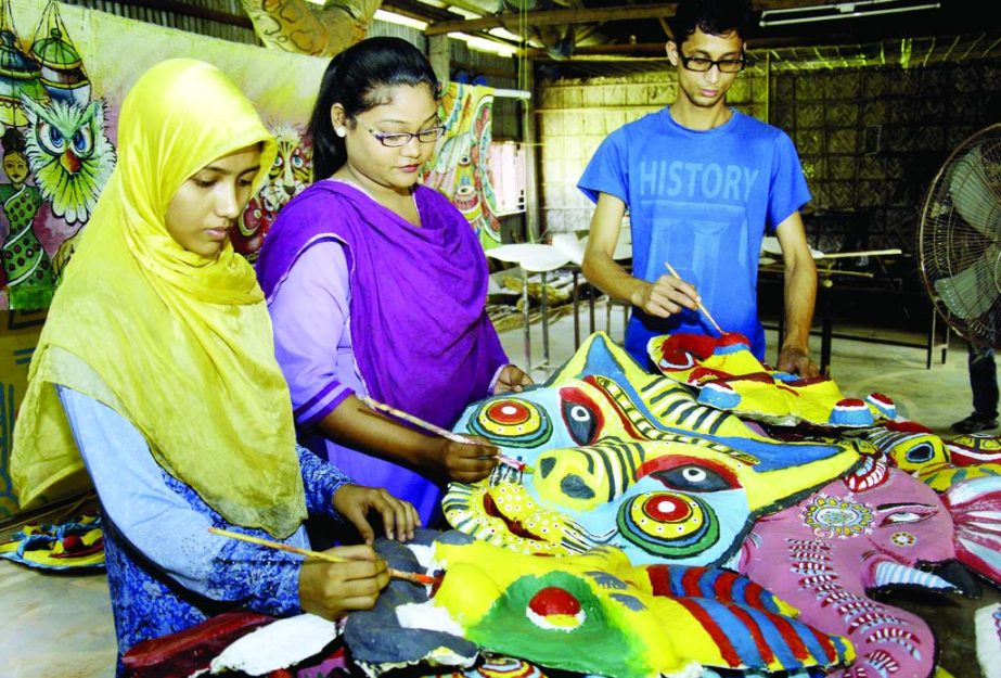 BOGRA: Students of Bogra Art College taking preparations to celebrate Pahela Boishakh.