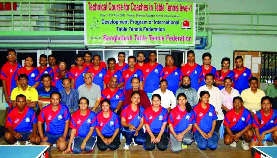 The participants of the International Table Tennis Level-1 Coaches Coaching Course and the officials of Bangladesh Table Tennis Federation pose for a photo session at the Shaheed Tajuddin Ahmed Wooden Floor Gymnasium on Friday.