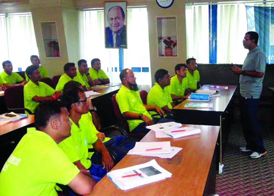 Instructor Saiful Bari Tito (right) giving lecture to the participants of the AFC C License Certificate Coaching Course at the Bangladesh Football Federation House on Friday.