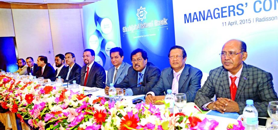 AK Azad, Chairman of the Board of Directors of Shahjalal Islami Bank Limited, inaugurating "Managers' Conference-2015" of the bank at a city hotel on Saturday. Farman R Chowdhury, Managing Director of the bank presided.