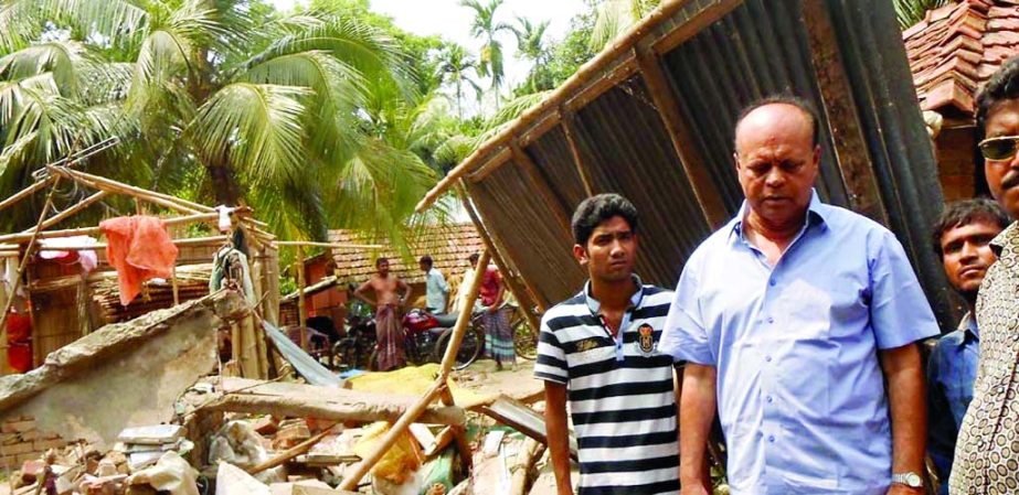 Monirampur (Jessore): Shapon Battacharjee MP visiting damaged houses caused by storm in Monirampur recently.