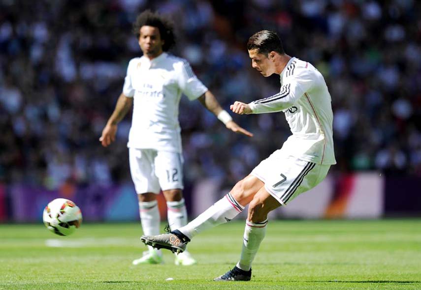 Cristiano Ronaldo of Real Madrid scores his team's opening goal from a free kick during the La Liga match between Real Madrid and Eibar at Estadio Santiago Bernabeu in Madrid, Spain on Saturday.