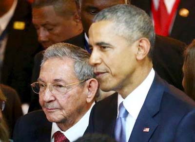 Cuba's President Raul Castro (L) stands with his US counterpart Barack Obama before the inauguration of the VII Summit of the Americas in Panama City.