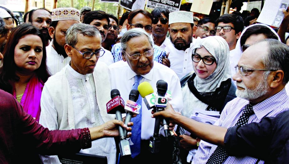 Former Vice-Chancellor of Dhaka University Prof Dr Emajuddin Ahmed and Afroza Abbas, wife of Dhaka South City Corporation mayoral candidate Mirza Abbas at an electioneering in favour of the latter at Palashi area in the city on Wednesday.