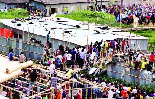 A two storied tin-shed shanty caved-in at city's East Rampura area near Boubazar Jhilpar on Wednesday leaving 11 people dead in accident.