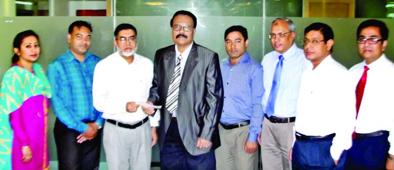 Swapan Kumar Sarkar, FCA, Chief Executive Officer of Delta Life Insurance Company Ltd, handing over a cheque of Tk. 67,00,000- to Ataur Rahman Majumder, Deputy General Manager of Rahim Afrooz (Bangladesh) Limited on Wednesday to settle Profit Commission