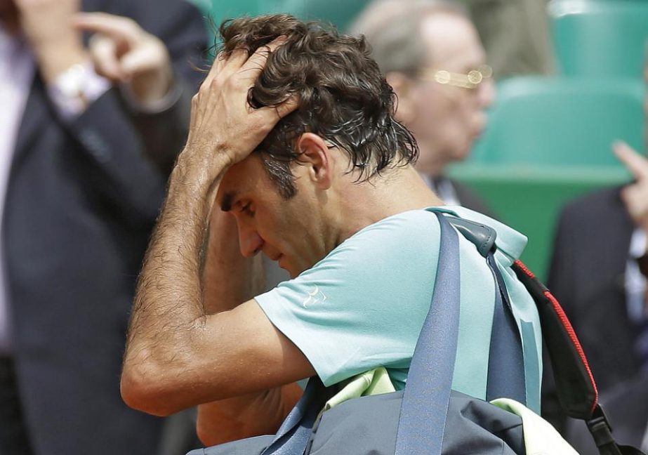 Roger Federer of Switzerland leaves the central court after losing his match of the Monte Carlo Tennis Masters tournament against Gael Monfils of France in Monaco on Thursday.