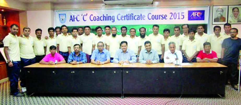 Participants of the AFC 'C' Coaching Certificate Course and the officials of BFF pose for a photo session at the BFF House on Friday.