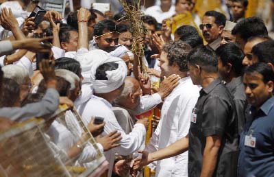 Congress party Vice President Rahul Gandhi holding talks with farmers outside his residence in New Delhi, India on Saturday.