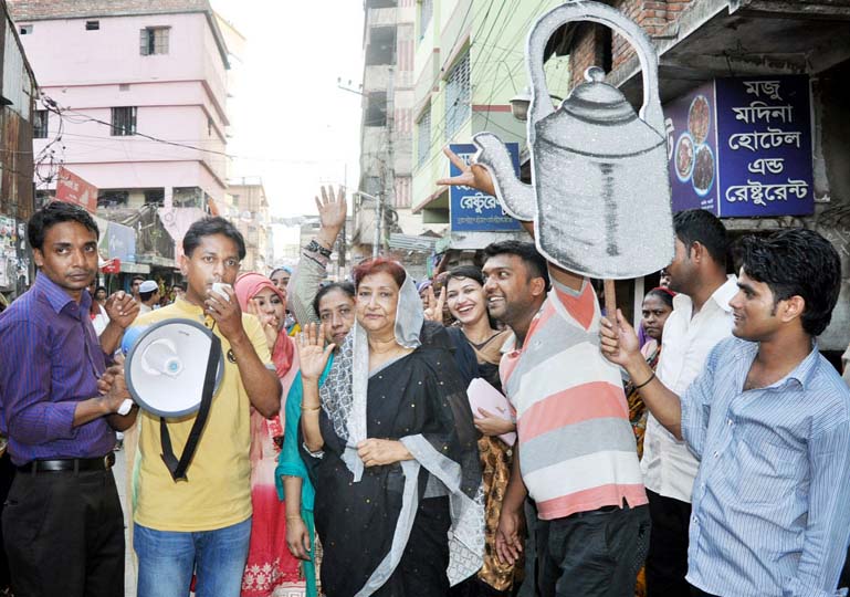 Joshna Begum candidate of reserved seat for women councillor of 33, 34 and 35 No Ward at an election campaign on Saturday.