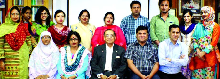 Dr M Mosharraf Hossain, Chairman and Managing Director of Rapport Bangladesh Limited, poses with the participants of a day-long workshop on "Communication and Presentation Skills" for the mid level executives from Titas Gas Transmission and Distribution