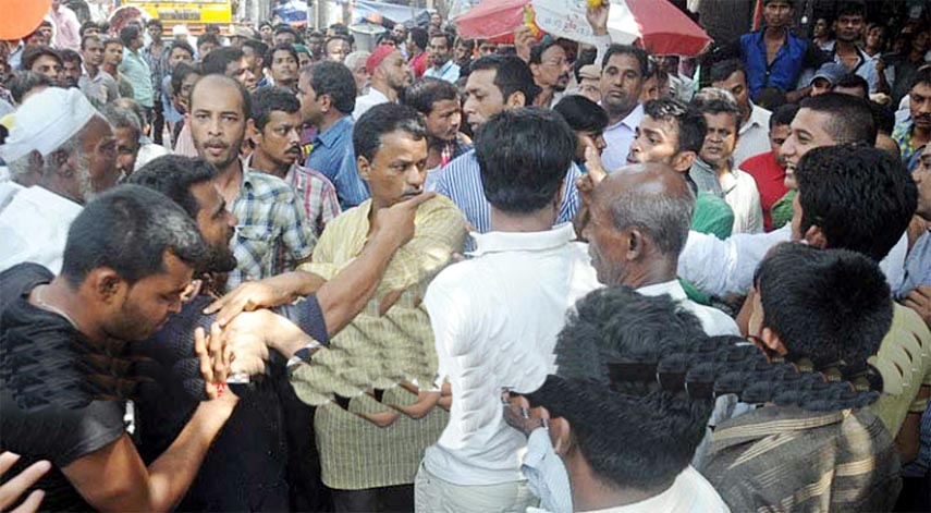 A view of the scuffle followed by altercations between two groups of city BNP occurred at Pathorghata area in city yesterday.