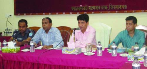 KISHOREGANJ: SM Alam, DC, Kishoreganj speaking at a preparation meeting on May Day at Kishoreganj Collectorate office on Wednesday.