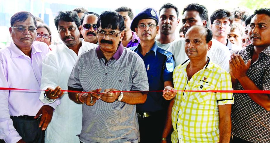 Local MP Babu Sukumar Ranjan Ghosh inaugurating Factory of Bikrampur Food Products by cutting ribbon in Sreenagar on Friday.