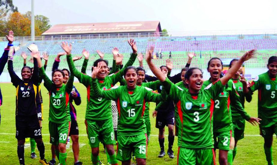 Players of Bangladesh U-14 Girlsâ€™ National Football team celebrate victory over IR Iran in the final of AFC U-14 Girlsâ€™ Regional Championship 2015 on Friday.