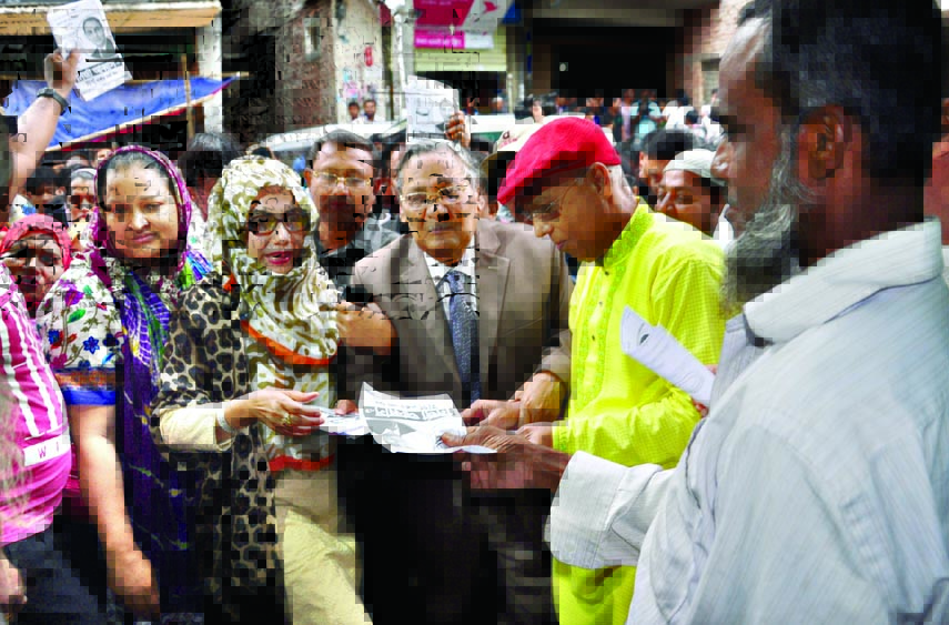 Afroza Abbas, wife of mayoral candidate of Dhaka South City Corporation Mirza Abbas at an electioneering in favour of the latter in the city's Mirhazibagh on Saturday.