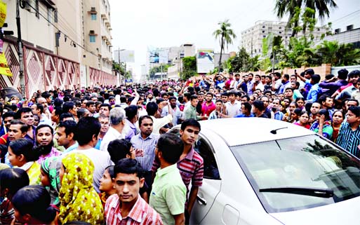 Thousands of panic stricken people came out of their homes and workplaces as strong earthquake jolted the city and other parts of the country on Saturday noon.