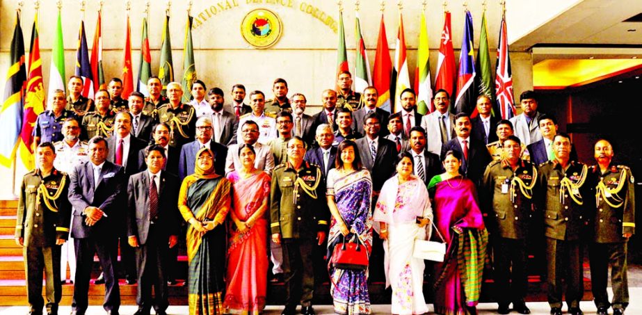 Participants of Capstone Course-2015 are seen with the NDC Commandant Lieutenant General Chowdhury Hasan Sarwardy, Bir Bikram at a photo session at National Defence College (NDC) at Mirpur Cantonment in the city on Sunday. Photo ISPR