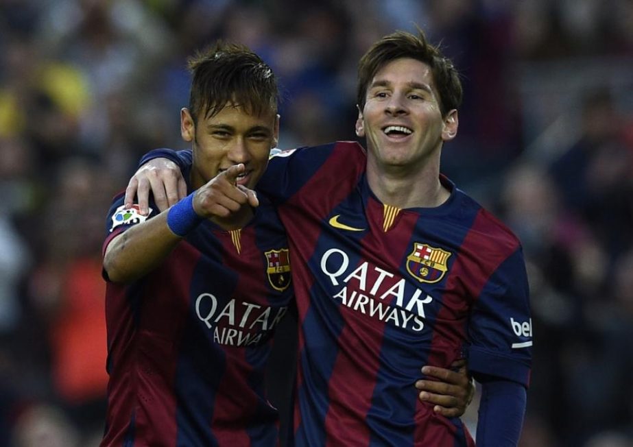Barcelona's forward Neymar (L) and Lionel Messi (R) celebrate after scoring during the Spanish league football match against Getafe in Barcelona on Wednesday.