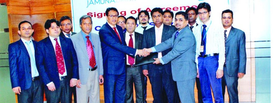 AKM Saifuddin Ahamed, Deputy Managing Director of Jamuna Bank and Dr Mohammed Arman Ullah, Head of Business Development & Marketing of Apollo Hospitals Dhaka, exchanging documents of corporate service facilities agreement recently.