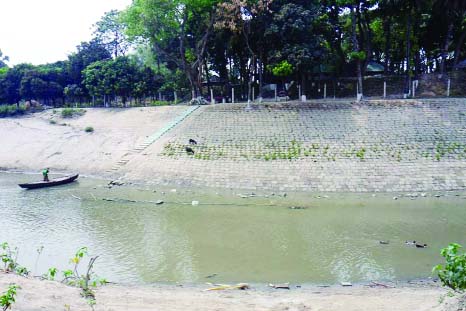 SAPAHAR (Naogaon): A bailey bridge is needed over Purnobhora River at BOP camp area in Sapahar Upazila situated at Kolmudanga border as boats are the only means of transport for the border guards. This picture was taken on Wednesday.